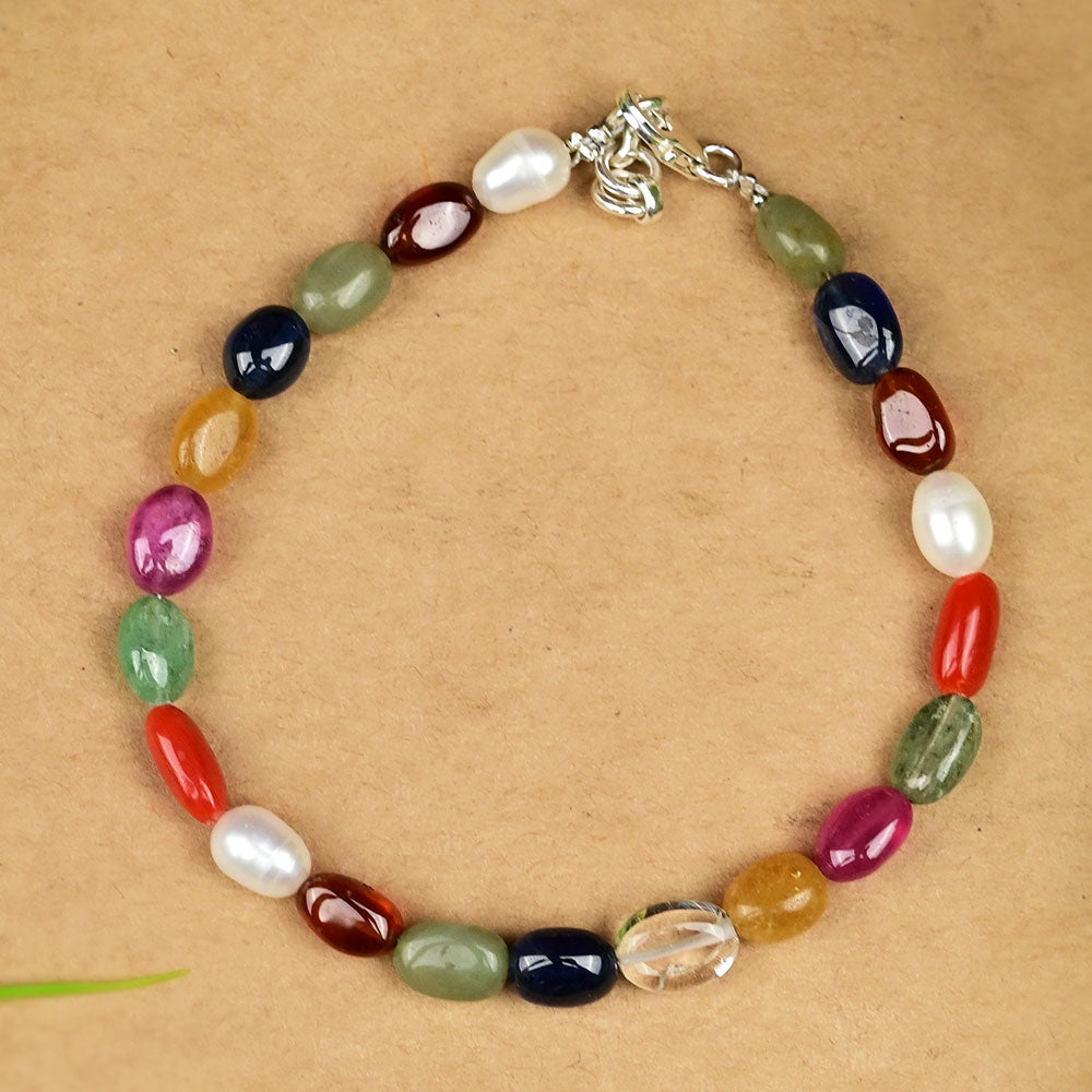 Navratna Oval Beads Bracelet-34.6 Carat