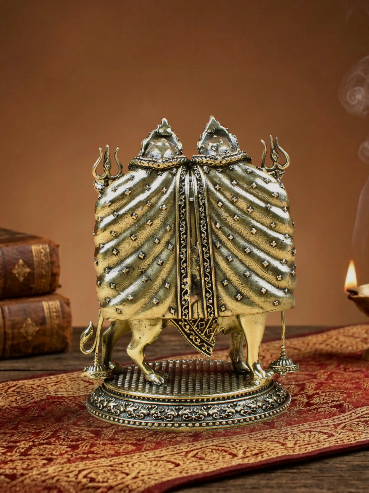Back angle of the traditional Ashtadhatu Goddess Chamunda Mata statue, displaying the detailed rear metal craftsmanship and dynamic posture.