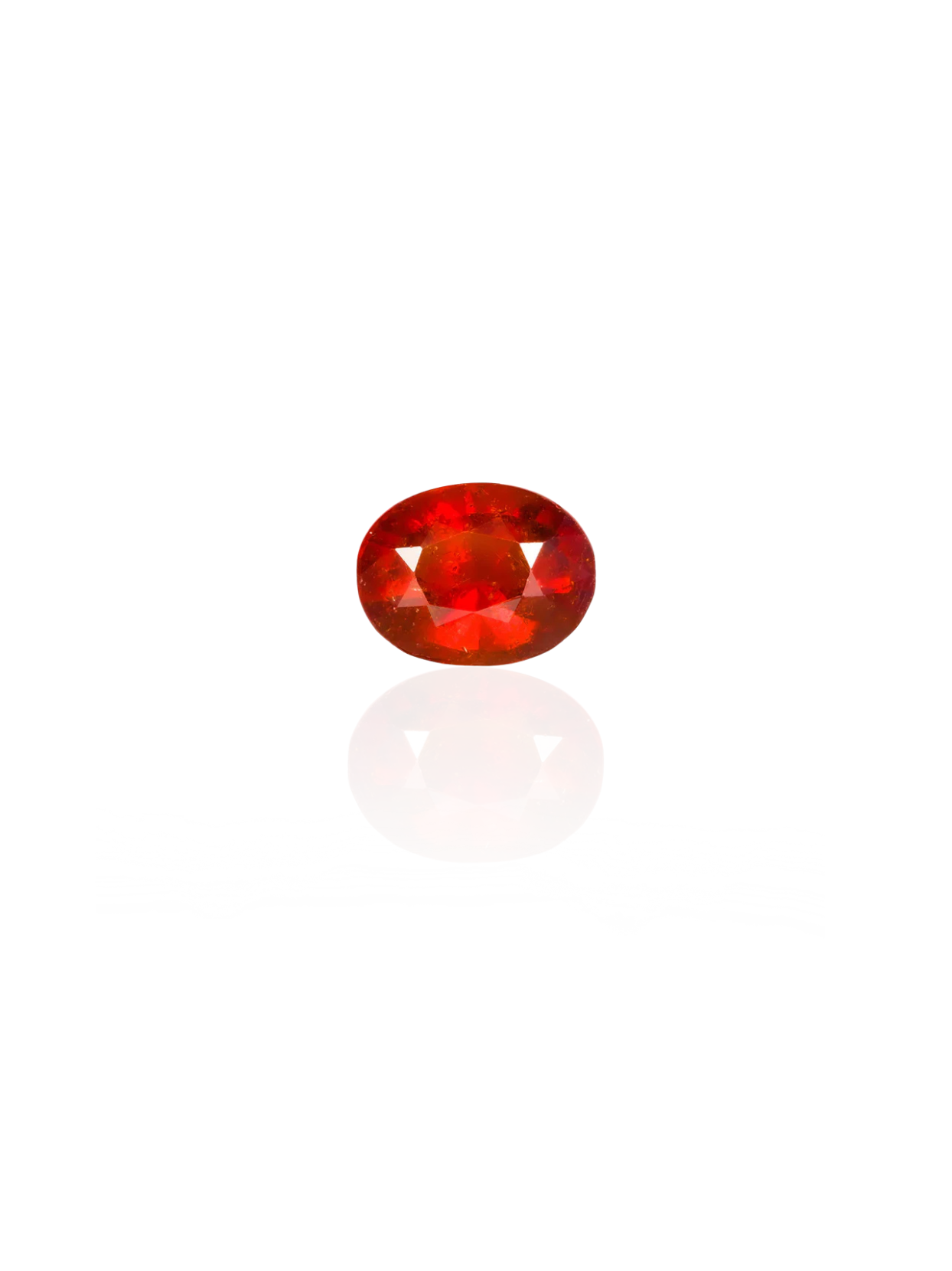 Clean studio shot of the Mani Monk approx 3-carat oval-cut Gomed gemstone, beautifully isolated on a bright white background with a subtle surface reflection