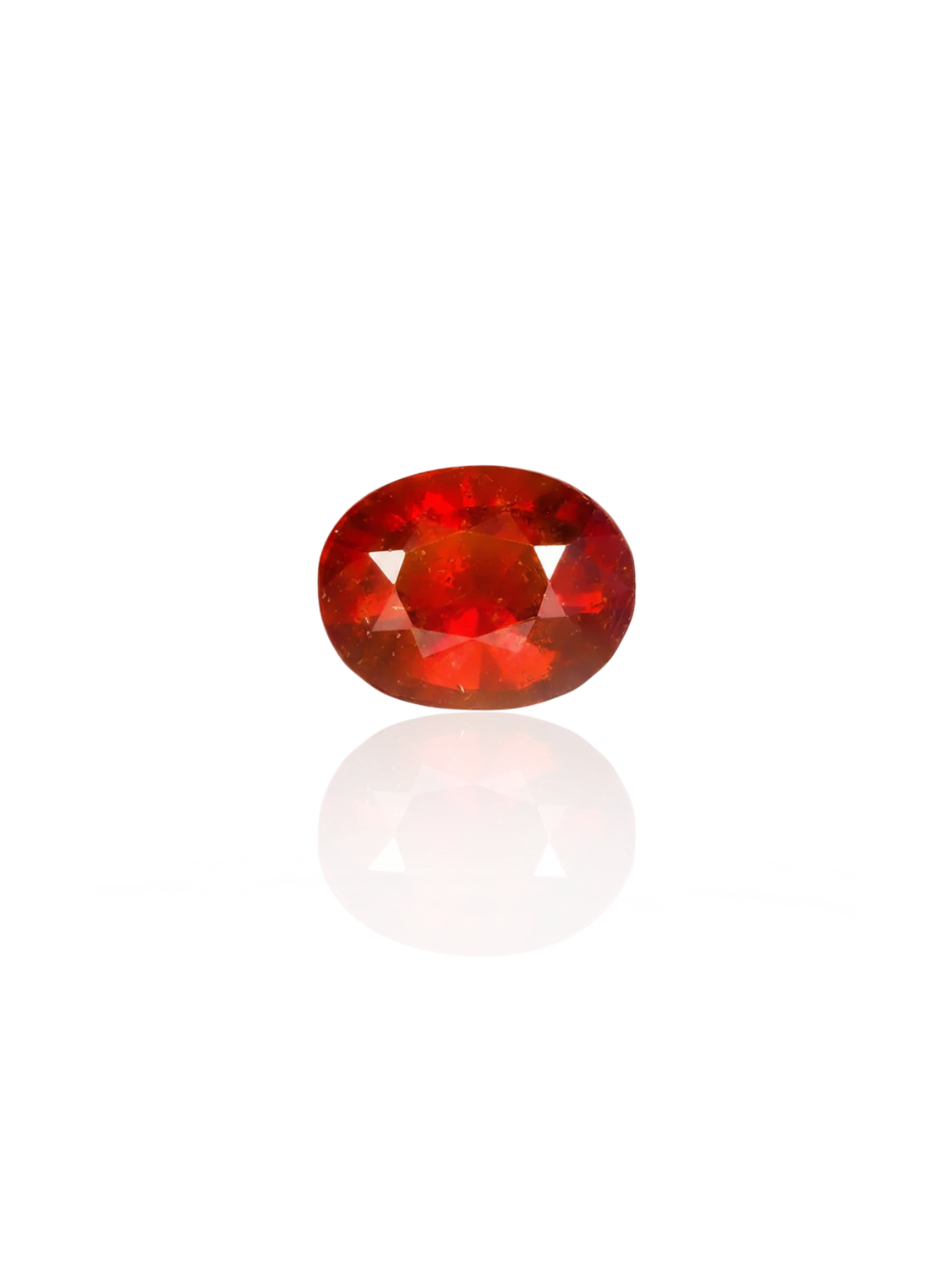 Clean studio shot of the Mani Monk approx 7-carat oval-cut Gomed gemstone, beautifully isolated on a bright white background with a subtle surface reflection.