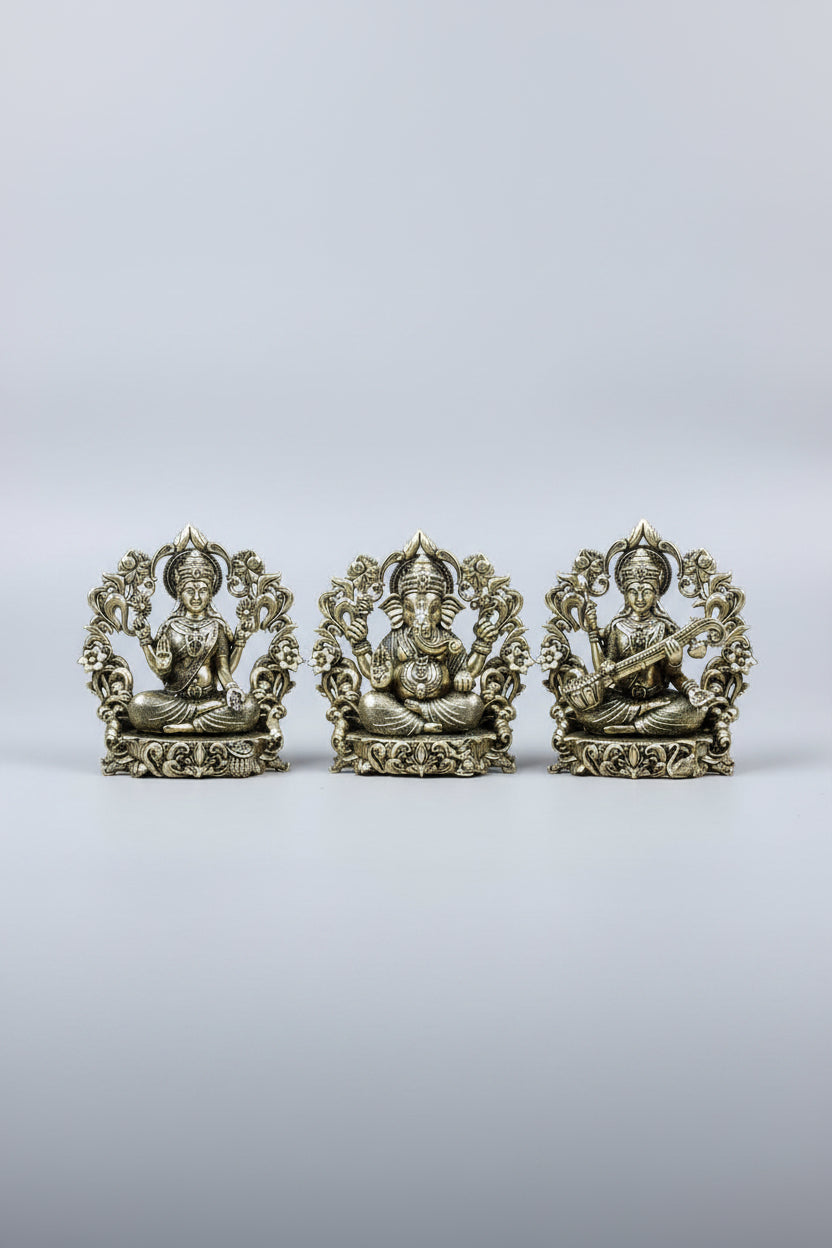 Lakshmi Ganesh Saraswati Floral Frame Ashtadhatu Idols Set Energised Divine Trio