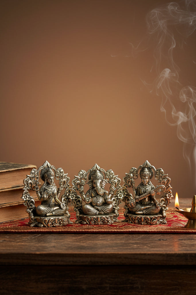 Lakshmi Ganesh Saraswati Floral Frame Ashtadhatu Idols Set Energised Divine Trio