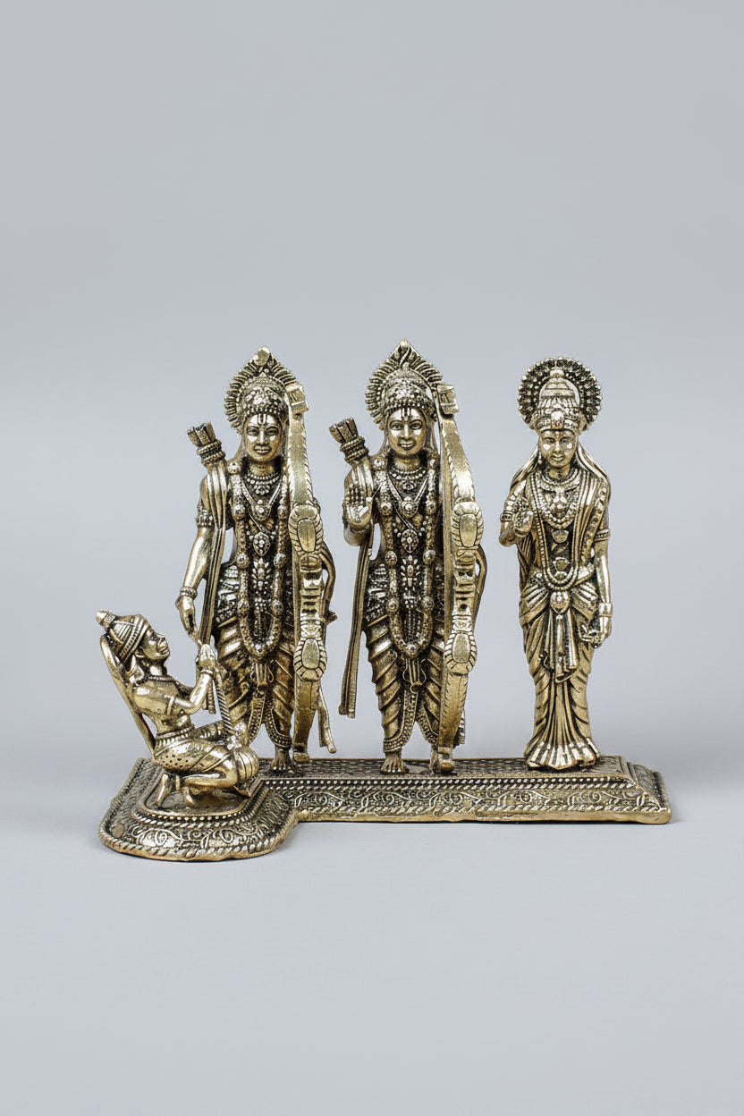 Ram Darbar Ashtadhatu Idol for home mandir, featuring the 8-metal statues on a textured surface with a candle in the background.