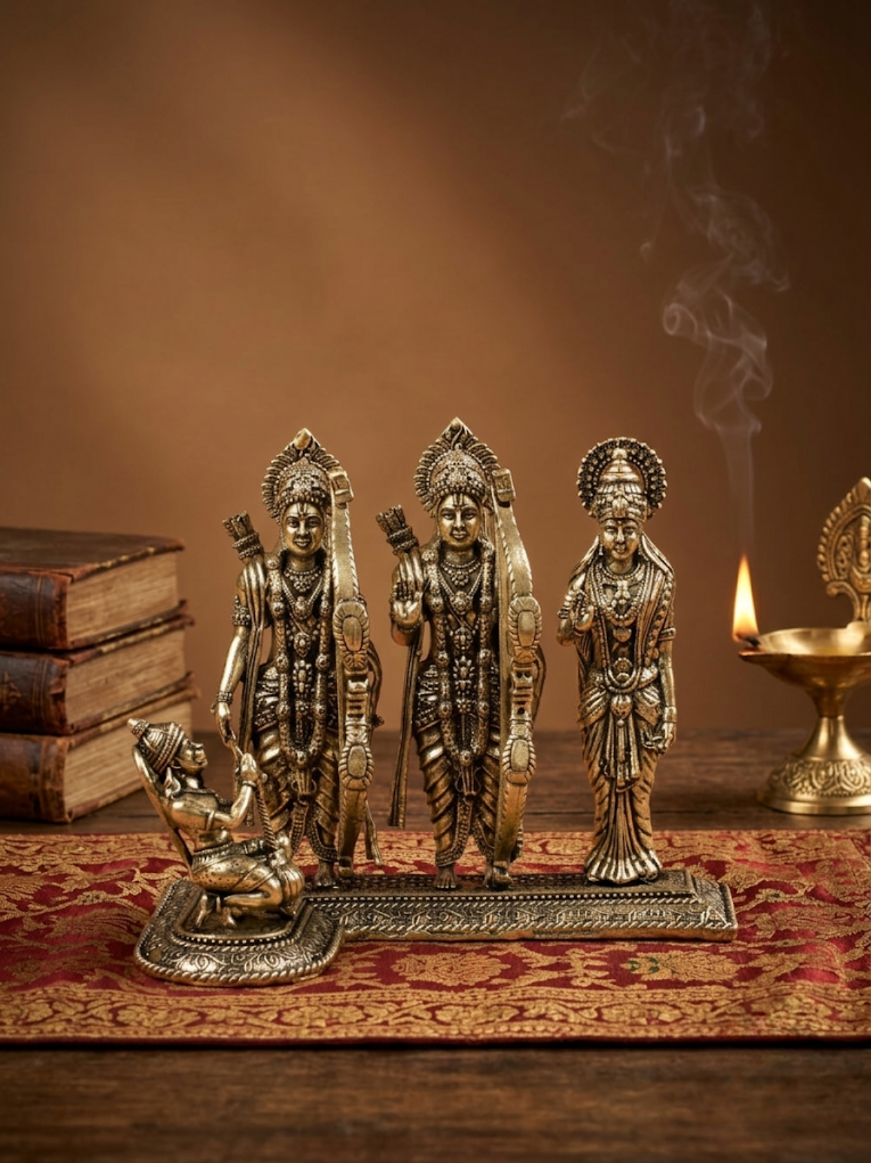 Ram Darbar Ashtadhatu Idol for home mandir, featuring the 8-metal statues on a textured surface with a candle in the background.
