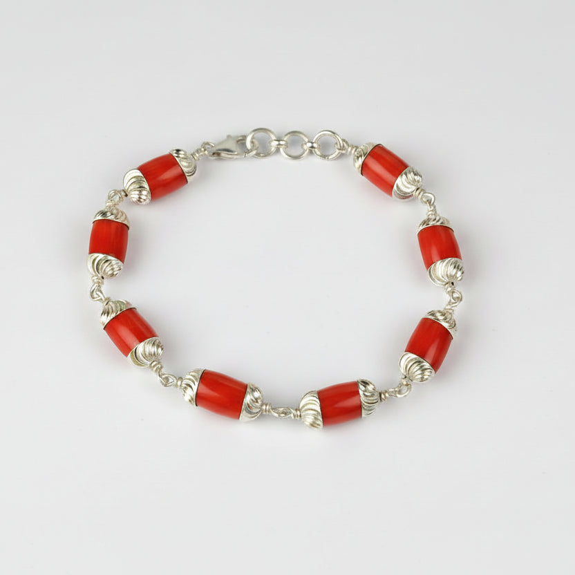 Red Coral Cylindrical Beads in Designer Silver Caps Bracelet