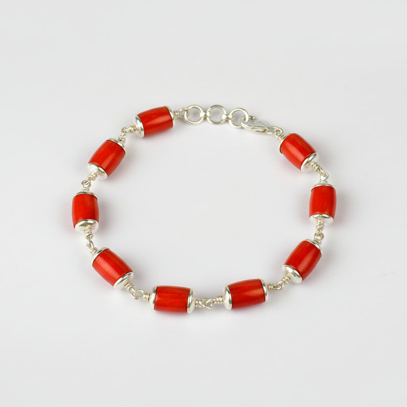 Red Coral Cylindrical Beads in Plain Silver Caps Bracelet