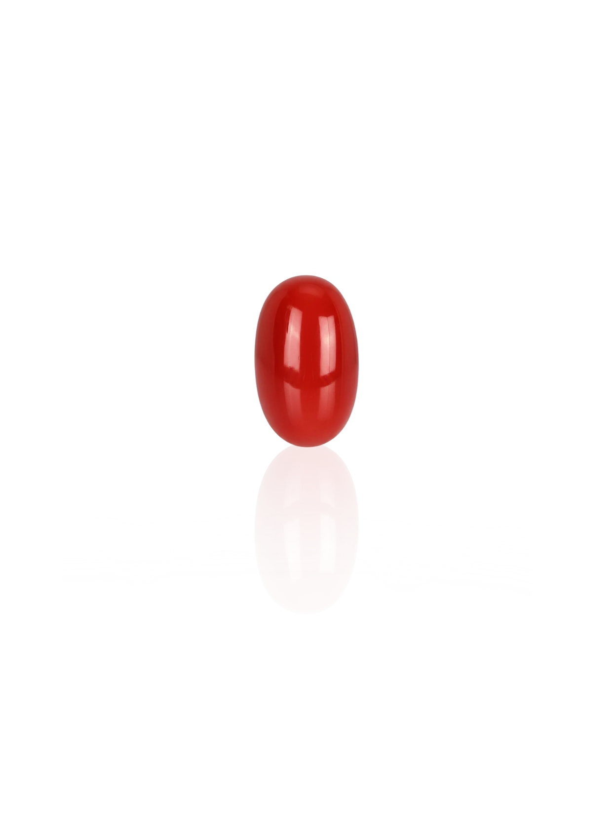 Clean studio shot of the Mani Monk approx 7-carat Japanese Red Coral gemstone, beautifully isolated on a bright white background with a subtle surface reflection.