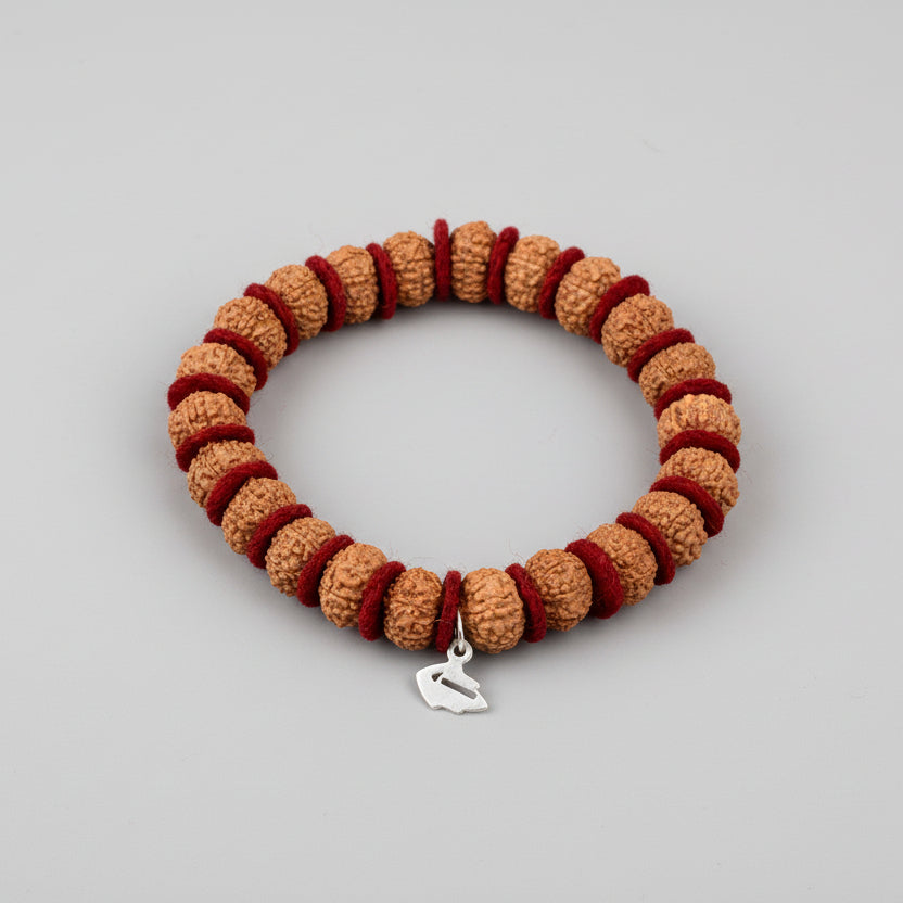 7 Mukhi Mahalaxmi Bracelet From Java In Woolen Spacers-10 mm