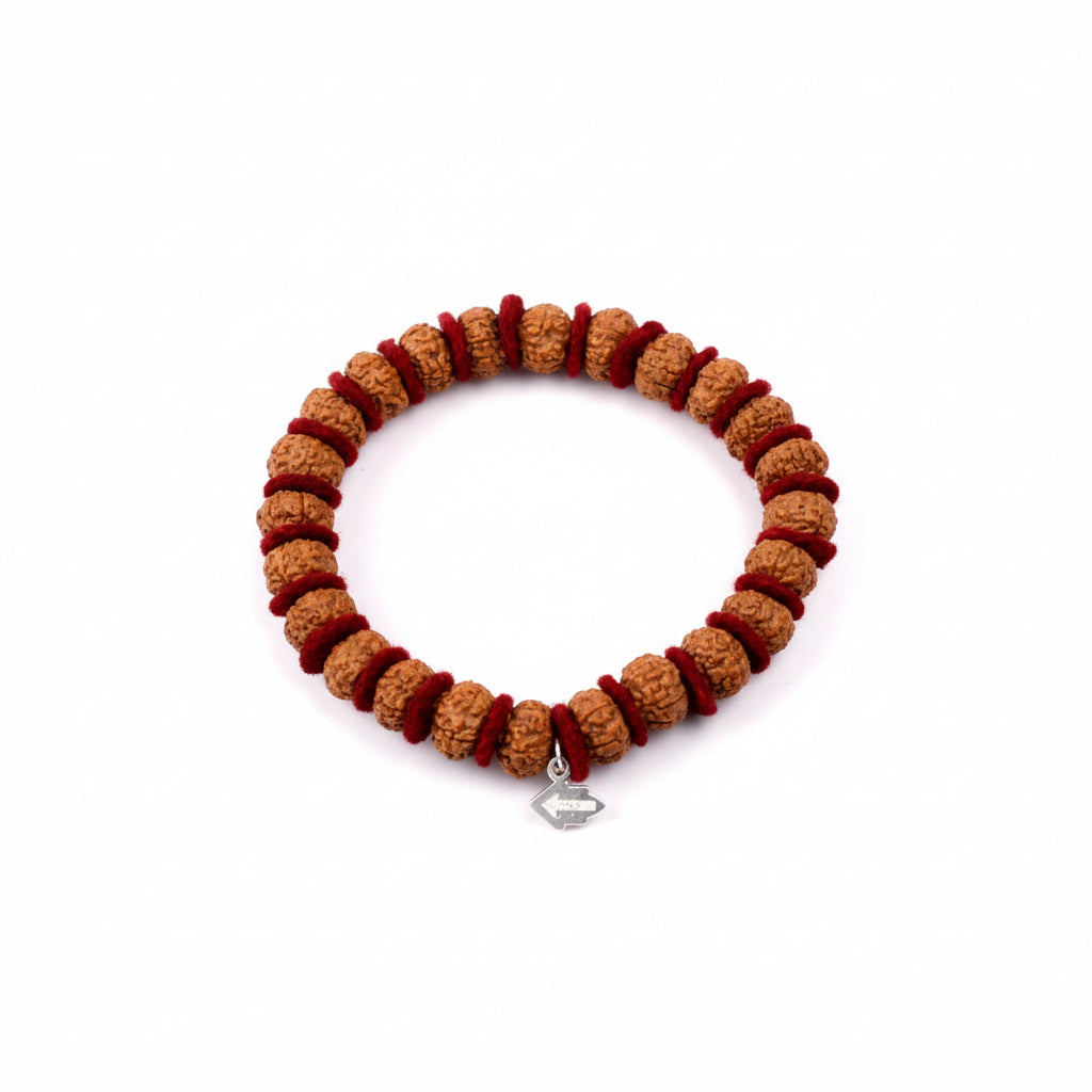 10 Mukhi Krishna Bracelet From Java In Woolen Spacers-12 mm