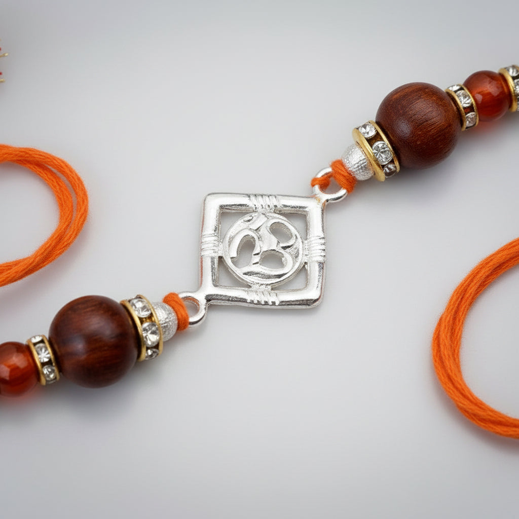 OM Design Rakhi in Pure Silver with Red Sandalwood Bead in thread - I