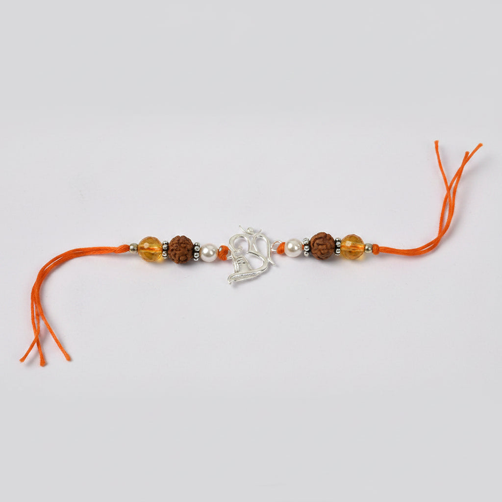 Om Rakhi With Citrine and Pearl beads
