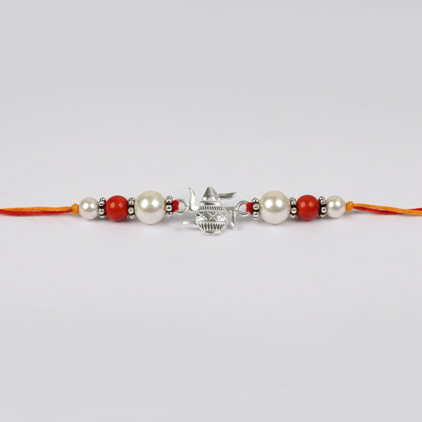 Kalash Swastik Rakhi With Coral and Pearl