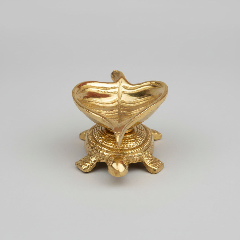 Brass Peepal Leaf Diya on Kurma