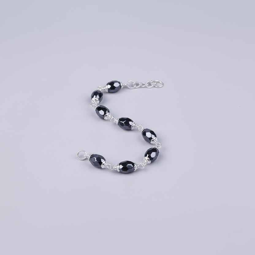 Hematite Faceted Oval Beads 925 Silver Flower Caps Bracelet