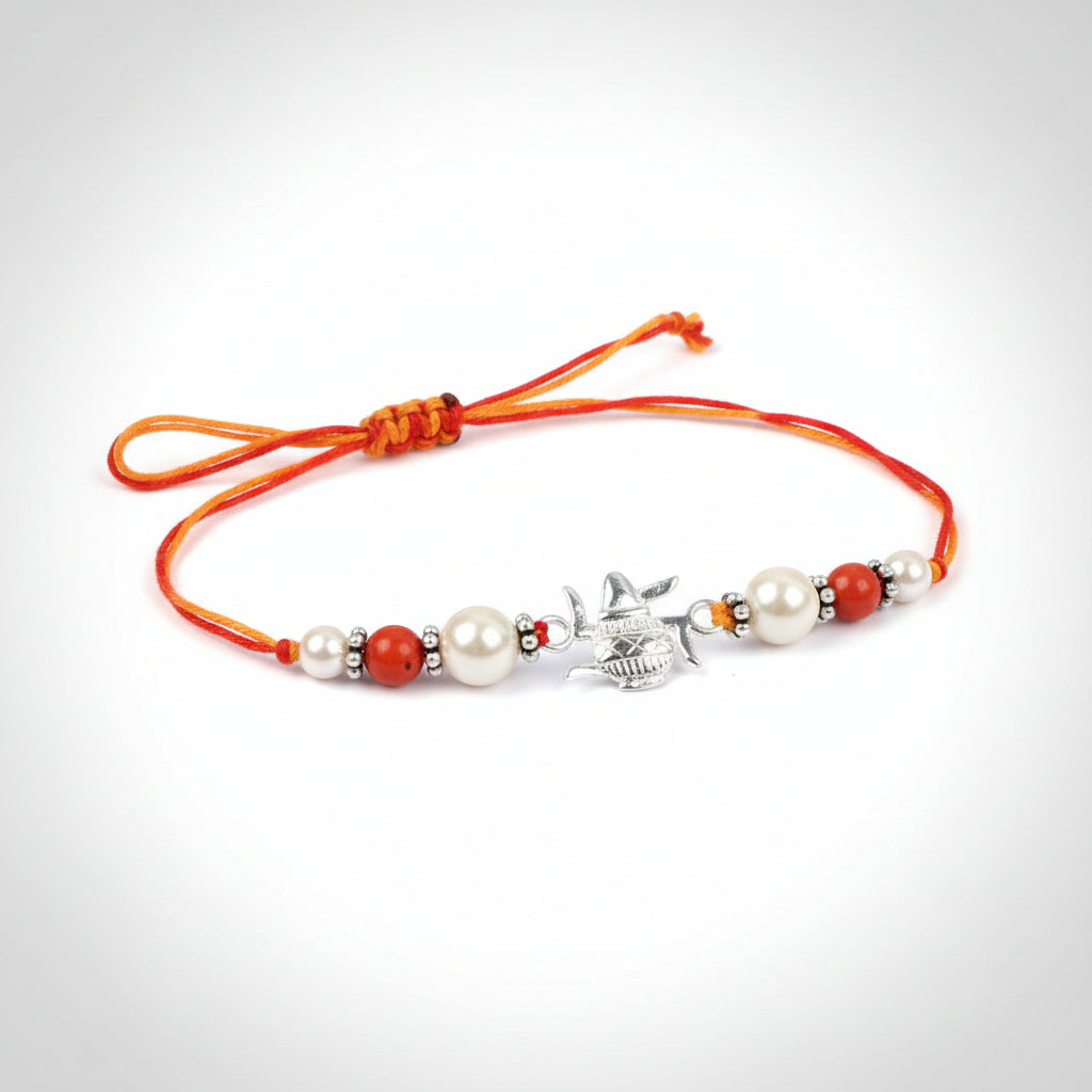 Kalash Swastik Rakhi With Coral and Pearl
