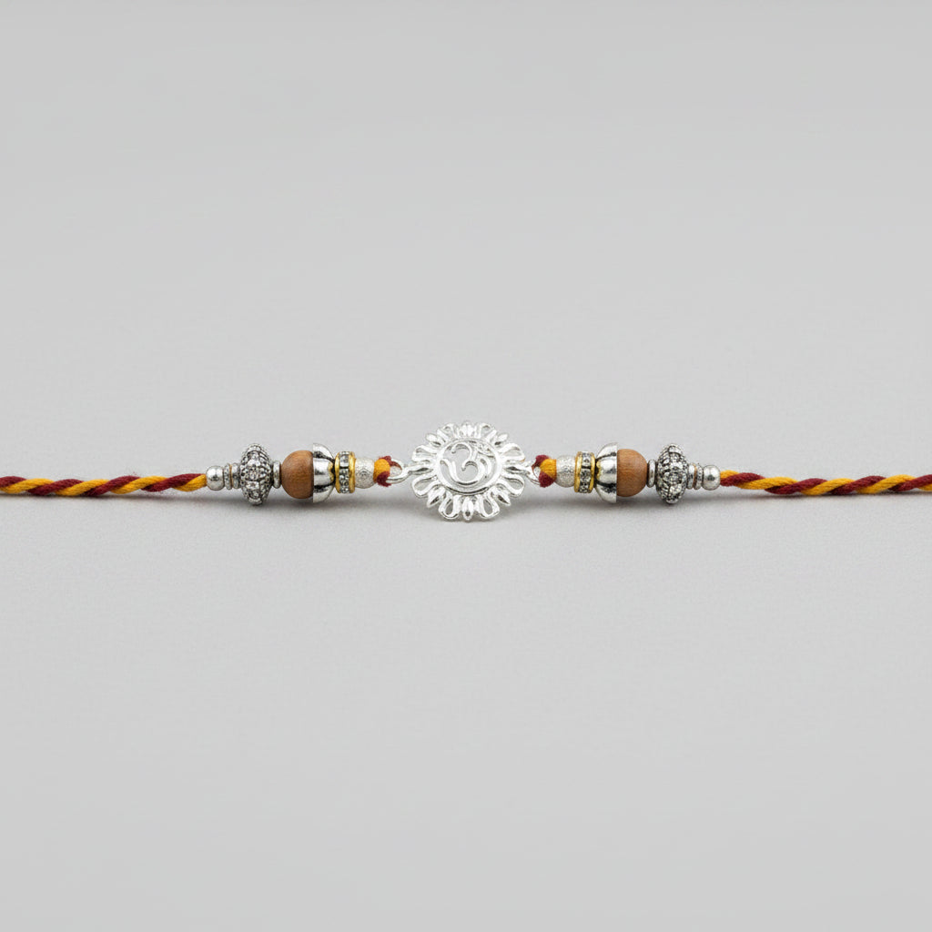 OM Design Rakhi in Pure Silver with Sandalwood Bead in thread - II