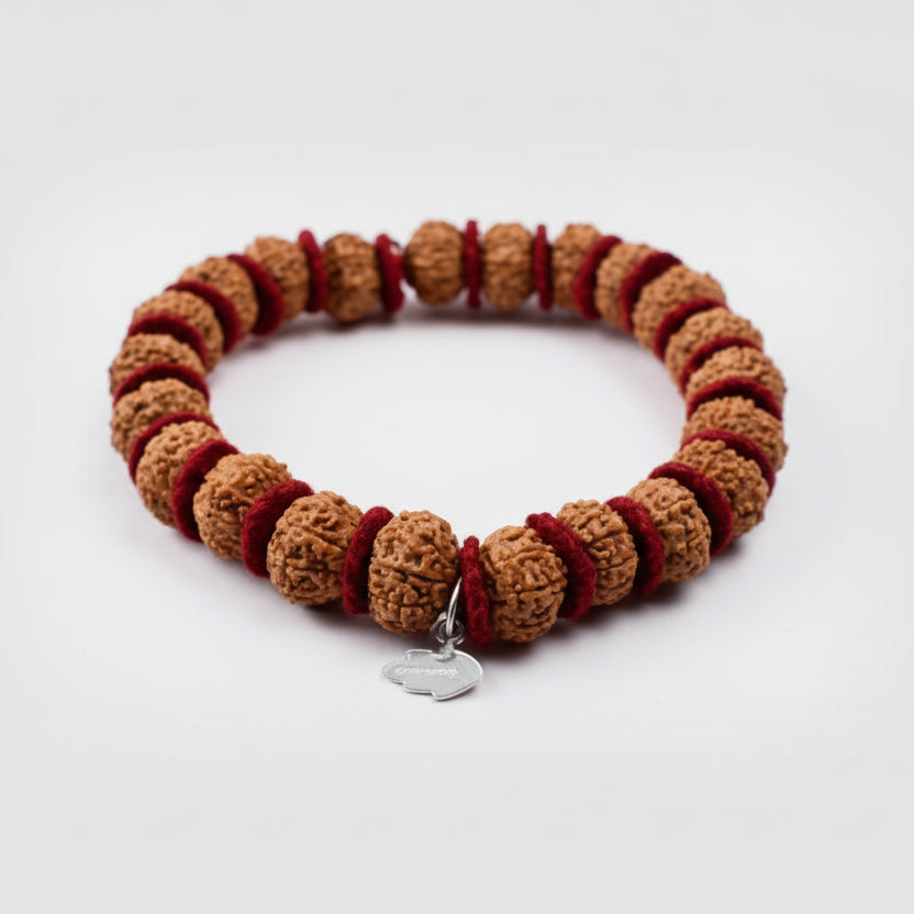 10 Mukhi Krishna Bracelet From Java In Woolen Spacers-12 mm