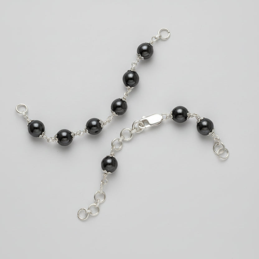 Hematite Bracelet in Pure Silver Flower Caps